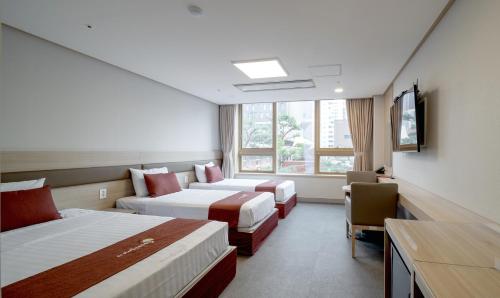 Chambre triple, 3 lits