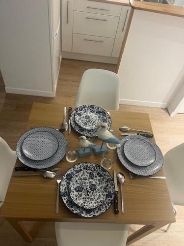 Appartement lumineux en rez-de- jardin Appartement lumineux en rez-de- jardin