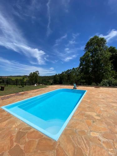 Sitio para relaxar com piscina e campo de areia in Cruzilia