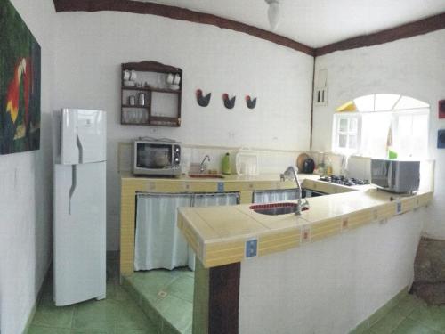 ห้องครัว, Casa do Joca - Ilhabela in หาดเฟย์ติเซย์รา