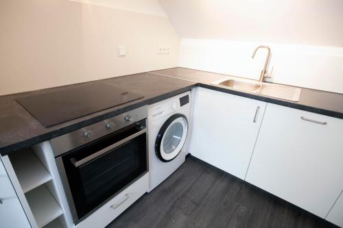 廚房, Moderne Wohnung nach Sanierung in 阿爾斯多夫