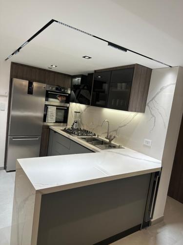 Kitchen, APARTAMENTO Lujo Lecheria 2 HAB 2 BANOS 7 PERSONAS-Planta Electrica in Puerto La Cruz