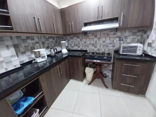 廚房, Apartamento Céntrico y Acogedor Tu Hogar lejos de Casa (Apartamento Centrico y Acogedor Tu Hogar lejos de Casa) in 圖皮薩