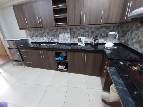 廚房, Apartamento Céntrico y Acogedor Tu Hogar lejos de Casa (Apartamento Centrico y Acogedor Tu Hogar lejos de Casa) in 圖皮薩