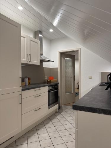 廚房, Einfamilienhaus unterm Dach in 林巴赫-奧伯弗羅納