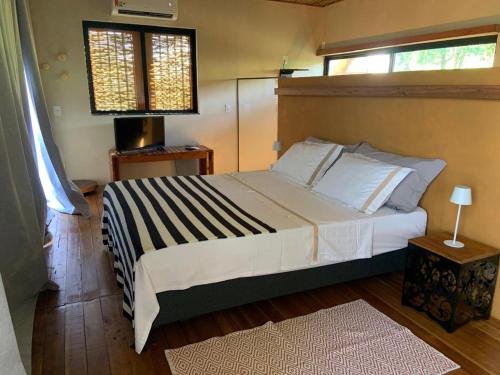 Cabana Terra frente para rio in เดลฟิโนโปลิส
