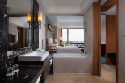 Bathroom, Courtyard by Marriott Suzhou in Suzhou