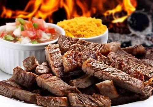 restavracija, Suítes Recanto Das Cerejeiras (Suites Recanto Das Cerejeiras) in Campos Do Jordao