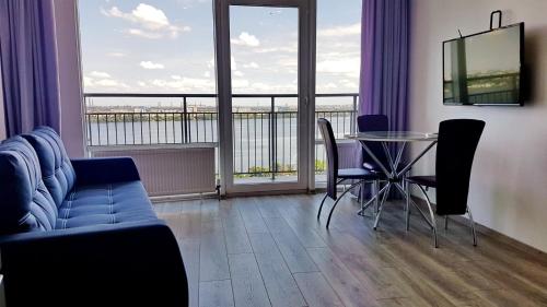 One-Bedroom Apartment with Balcony and Water View image 10