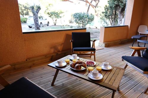 Toit ja joogid, Perla di Mare - T3 avec piscine et accès plage (Perla di Mare - T3 avec piscine et acces plage) in Figari