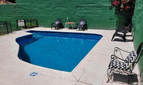 Hotel Belgrano in วิลลา คาร์ลอซ พาซ