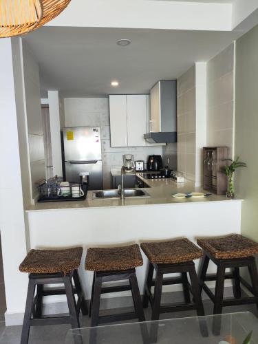 주방, Apartamento El palmar frente al mar in 산 카를로스