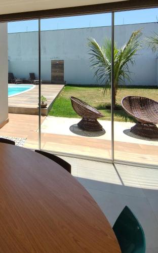 Swimming pool, Casa alto padrao em bairro nobre de Caldas Novas com piscina quente e sala de jogos in Parque Real