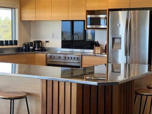 Wharekapua Beach House in Pukenui