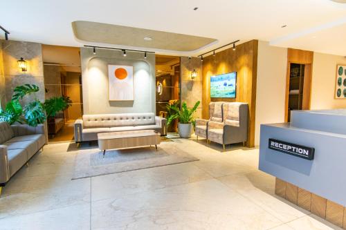 Shared lounge/TV area, Hotel Sing 65 near JP Park