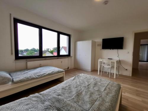 Großzügige Monteurwohnungen mit perfekter Verkehrsanbindung und Parkplatz (Großzugige Monteurwohnungen mit perfekter Verkehrsanbindung und Parkplatz) in Lampertheim