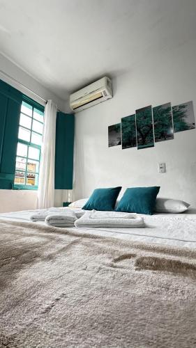 Suites & Hostel Manjericão (Suites & Hostel Manjericao) in ปาราตี