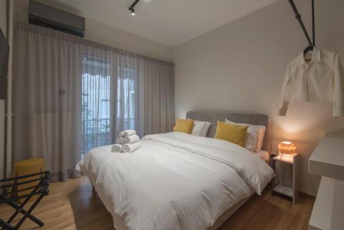 Modern Ilisian Apartment - Tap to explore photos