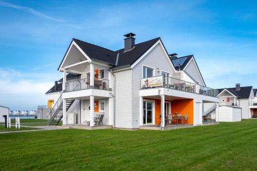 Unterkunft von außen, Fewo MEERwert by Seeblick Ferien ORO, Familienfreundlich, Sauna, Kamin,XL Dusche in Olpenitz