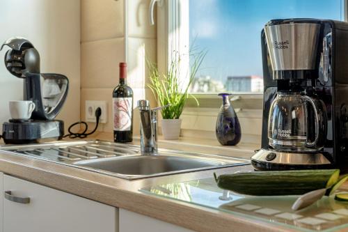Kitchen, Ferienhaus Strand Hus by Seeblick Ferien ORO, Bestlage am Strand,Sauna,Kamin in Olpenitz