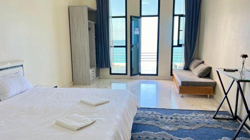Wadi Shab Beach Villa - Tap to explore photos