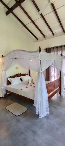 Family Suite with Balcony room in Induruwa Villa