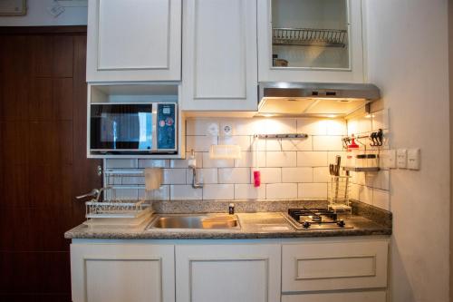 Nice and Cozy 1BR with Extra Room Apartment at Capitol Park Residence By Travelio – Jakarta, NY