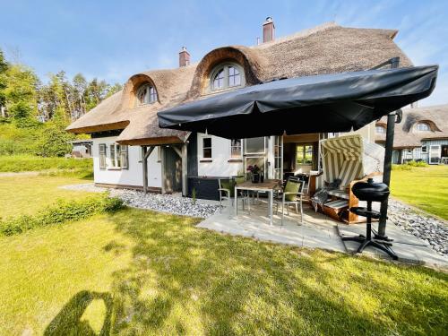 Ferienhaus Mee h r Zeit 07 Feriendorf Klein Stresow Rügen by ruyastay in Putbus, Deutschland