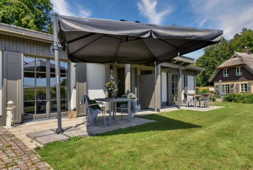 Ferienhaus Frische Brise 33 Feriendorf Klein Stresow Rügen by ruyastay in Putbus, Deutschland