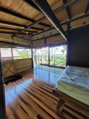 Casa da Arvore com visual para o mar e Ilha Campeche in Pedrita