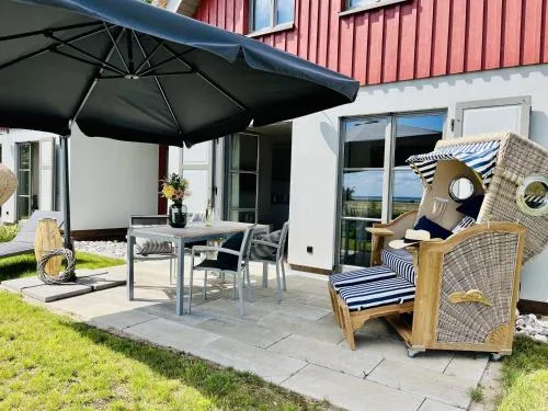 Ferienhaus Seeblick 19 Feriendorf Klein Stresow Rügen by ruyastay in Putbus, Deutschland