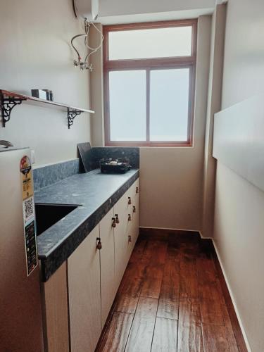 Kitchen, A La Maison in Lachumiere