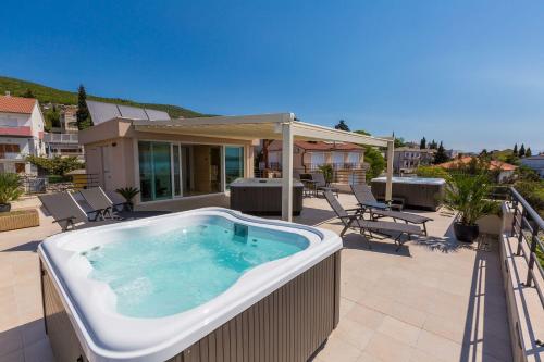 Exquisites Apartment nur 100 Meter zum Strand mit Sauna, Whirlpool, Meerblick