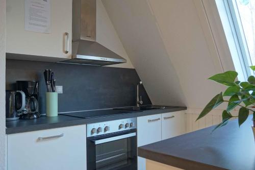 廚房, Familienurlaub im Wald am Twistesee Ferienhaus 105 nur 300 m zum See - Grill & Waschmaschine & hunde in 巴特阿羅爾森