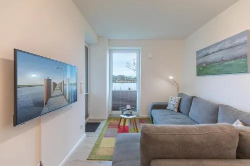 Ferienwohnung "Halligstork" direkt am Nordseedeich mit Blick auf den See in Nordstrand, Deutschland