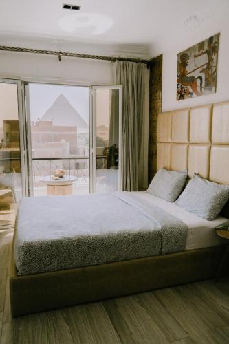 BrassJimmy pyramids view Room Type - Deluxe Double Room with Balcony