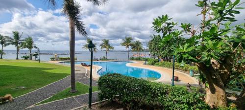 Nasugbu Resort, Beachfront Condo in Canyon Cove A1-101 in Natipuan