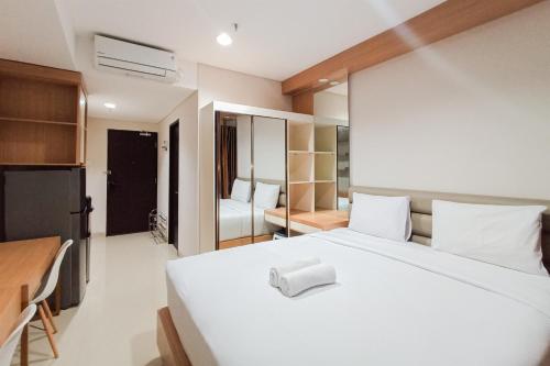 Homey Studio at Patraland Amarta Apartment By Travelio, Beran-kidul
