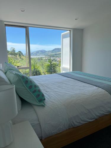 Highhaven on Quebec, sunny hillside, central Nelson hideaway with city to sea views, Nelson