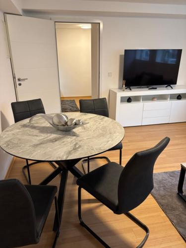 Közös társalgó / TV, M&L Appartement in Troisdorf