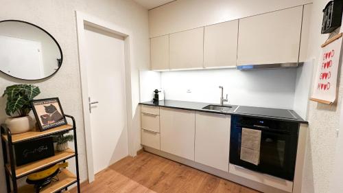 廚房, Grand studio au cœur de Crans et au pied des pistes in 克蘭斯蒙塔納