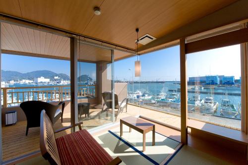 Room with Tatami Area with Open-Air Bath and Sea View