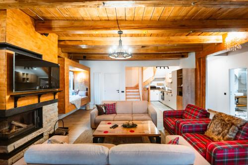 Koplietošanas atpūtas telpa ar TV, Chalet Belle Vue in Manecju
