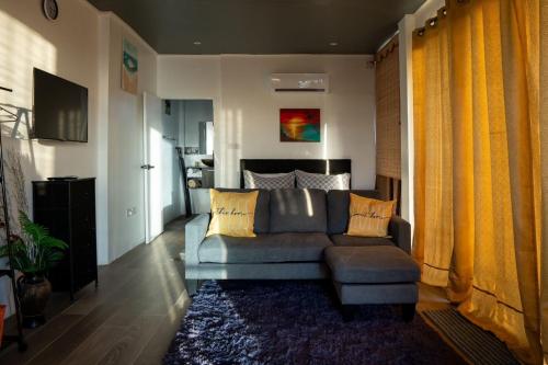 ห้องส่วนกลางสำหรับนั่งเล่น/ดูทีวี, Tranquil Vistas of Marigot in อ่าวมาริกอท