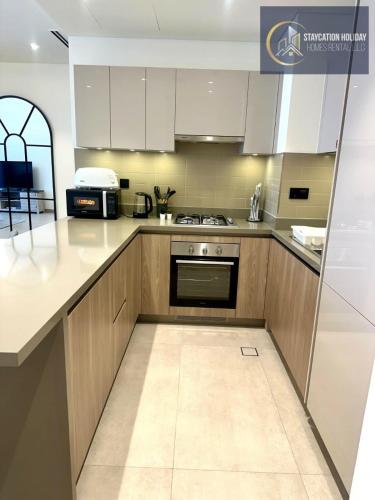 Stylish 1BR Lavish Living Waves Grande, Dubái (foto 7)