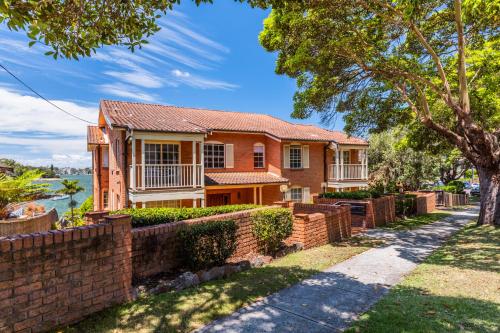 Stunning waterfront townhouse with shared swimpool, harbour view and free P