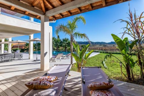 Dārzs, Royal Tiki Lodges - Chambres d'hôtes avec Piscine chauffée & SPA (Royal Tiki Lodges - Chambres d'hotes avec Piscine chauffee & SPA) in Plaissan