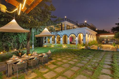 SaffronStays Dew Drops - 5BR pet-friendly villa with pool, gym, gazebo & Kikvi River views in Karjat, Dhamni