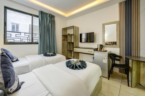 Downtown Hotel للعائلات فقط – Al' Aqabah, TX