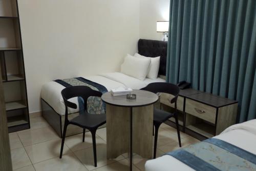 Downtown Hotel للعائلات فقط – Al' Aqabah, TX